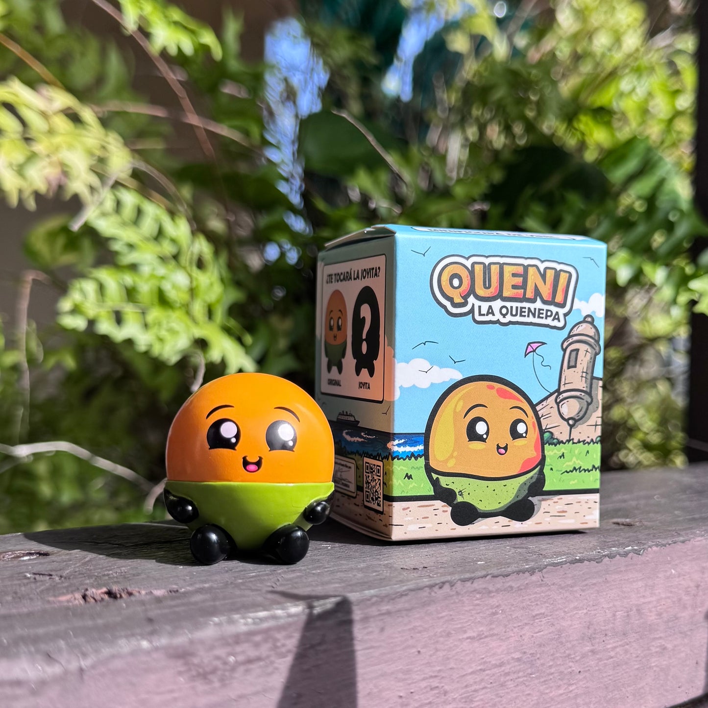 Queni la Quenepa™ - Figurita Coleccionable